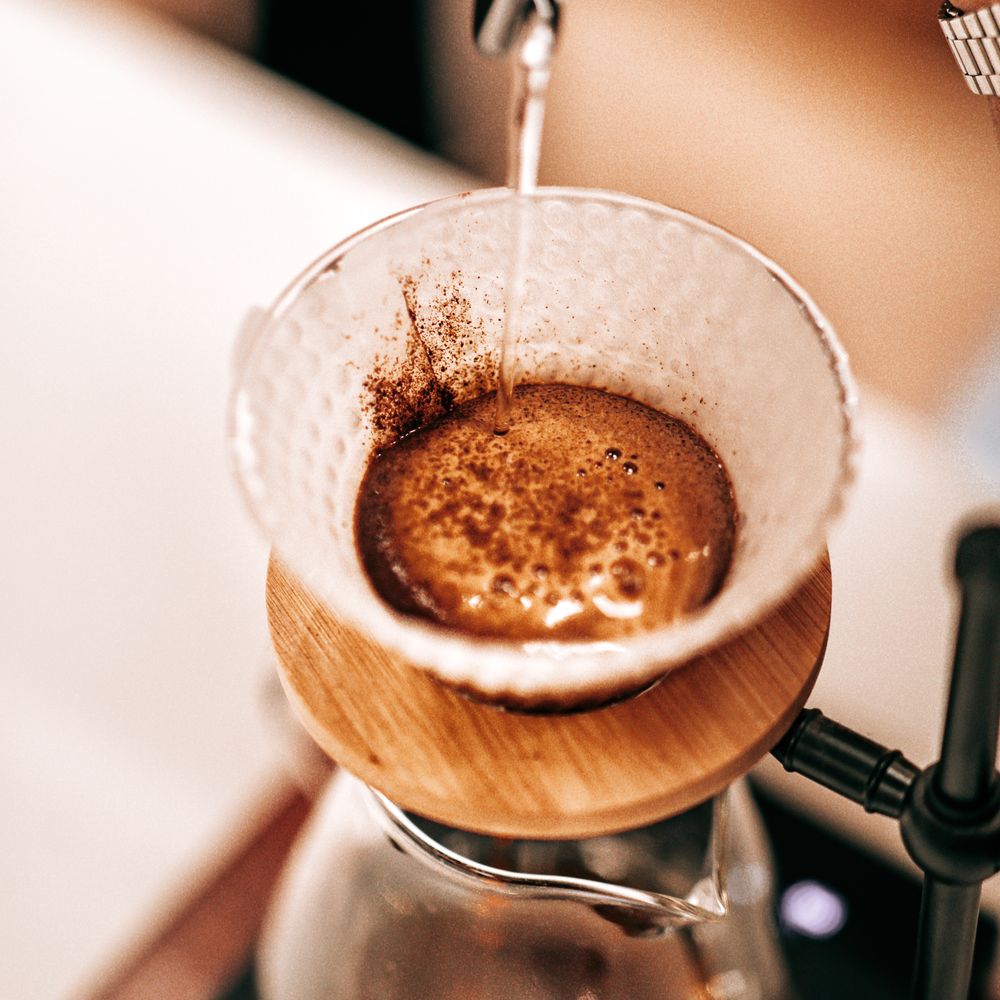 Pour-over coffee dripping through a filter