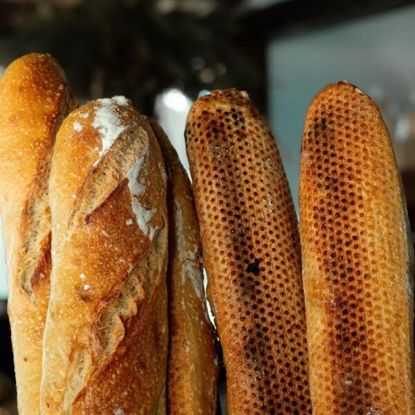 Baguettes standing on a counter
