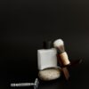 Shave set arranged on a stone with the razor in front