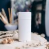 White deodorant stick on a wooden surface