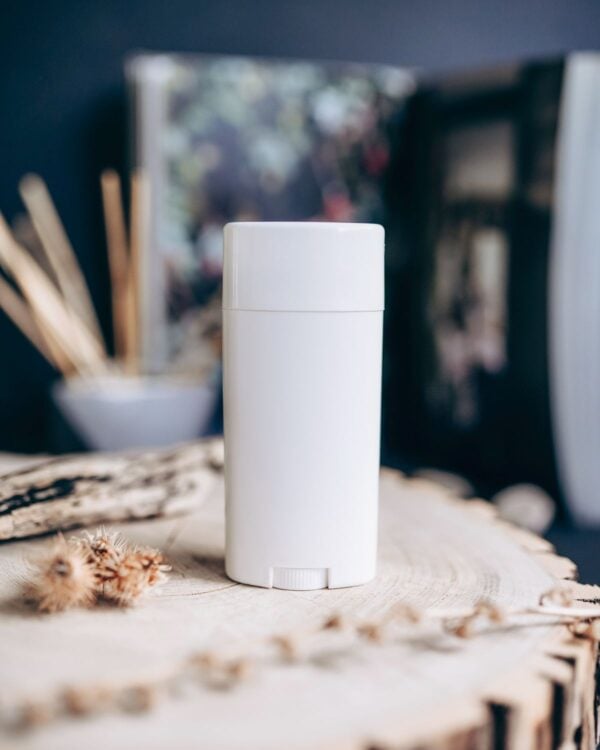 White deodorant stick on a wooden surface