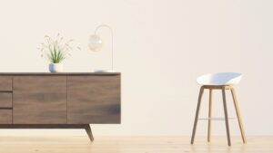 Walnut sideboard against a white wall