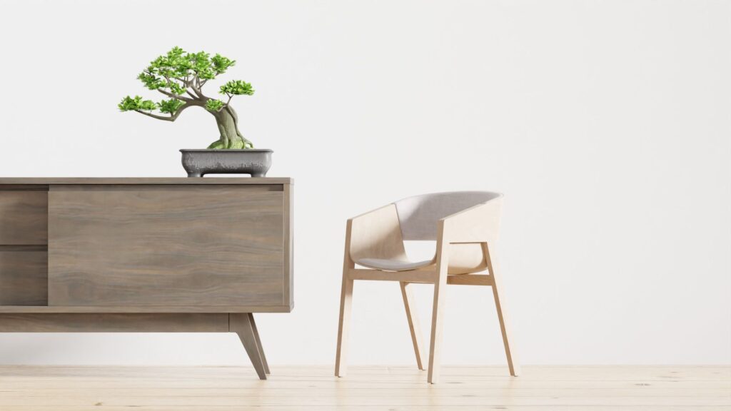 Buffet cabinet styled with a bonsai and chair