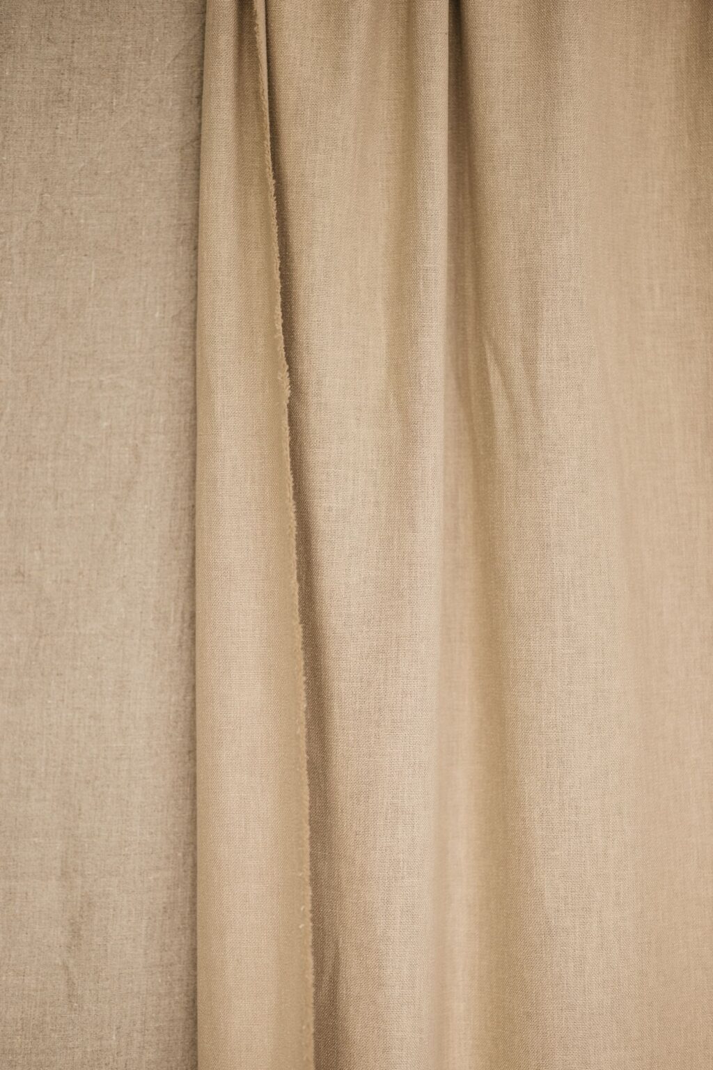 Beige linen curtain in soft light