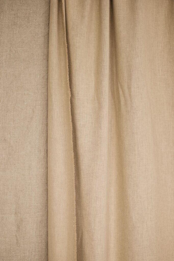 Beige linen curtain in soft light