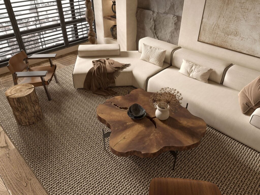 White sofa, live-edge coffee table and jute rug in a bright living room