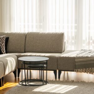 Grey sectional sofa in a sunlit living room