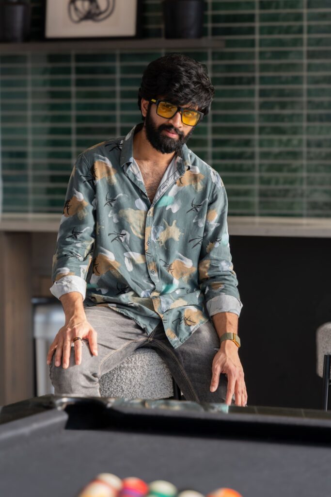 Portrait of a designer seated in a studio