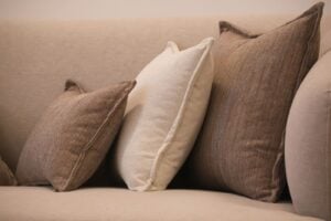 Neutral cushions on a sofa