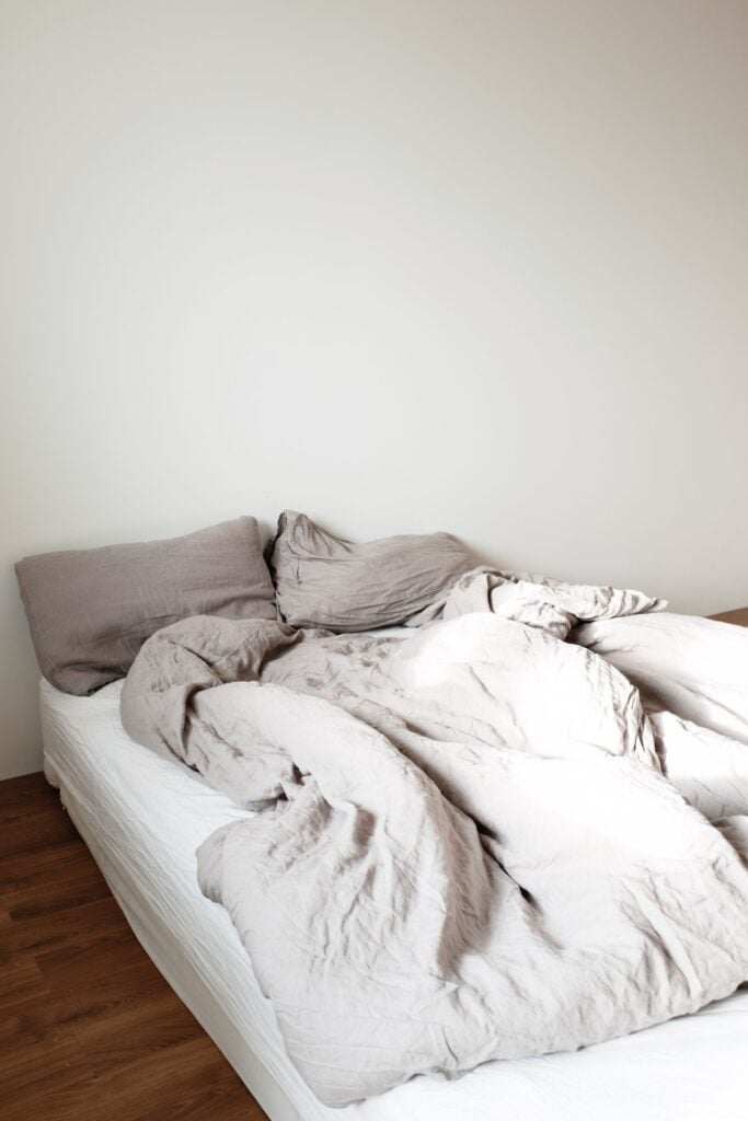 Crumpled beige linen sheets
