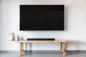 Television on a low wooden media bench