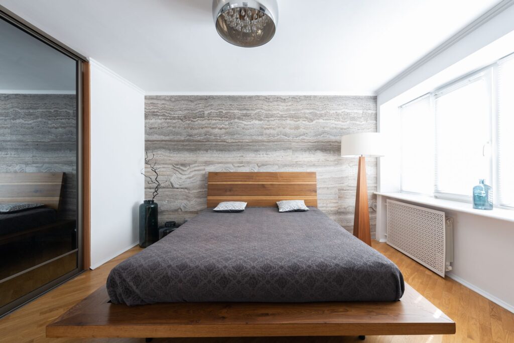 Platform bed with upholstered headboard, front view