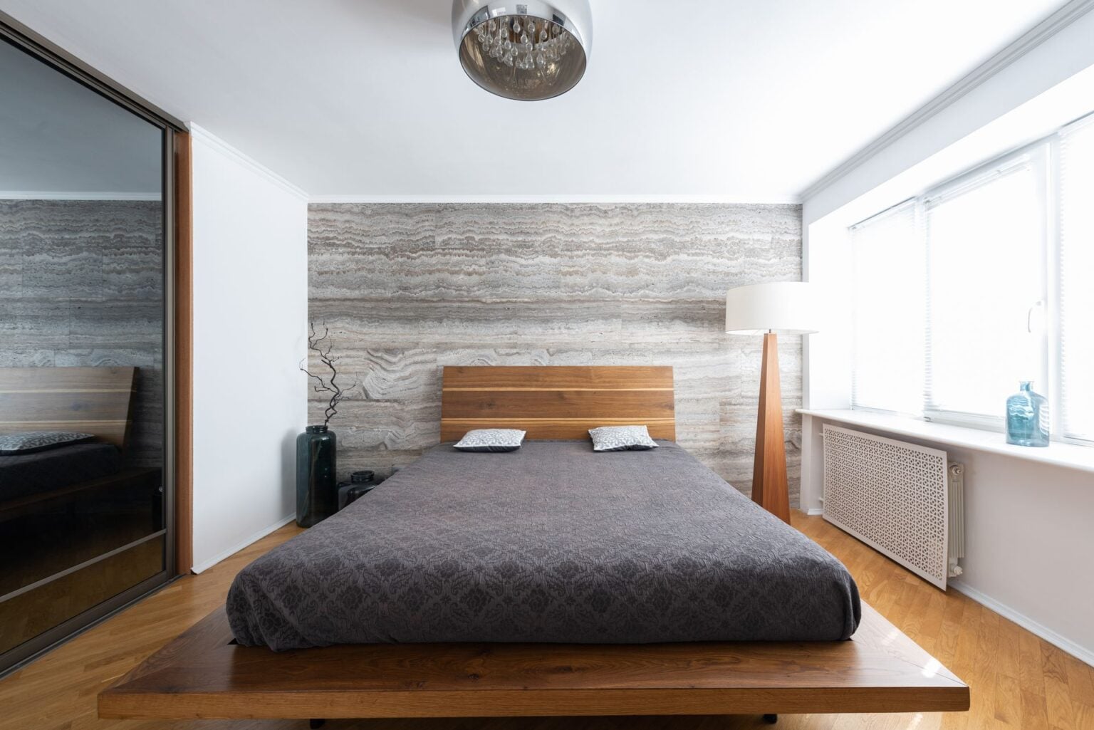 Platform bed with upholstered headboard, front view