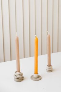 Tapered candles in minimal holders
