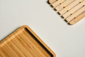 Wooden decorative tray on a light surface