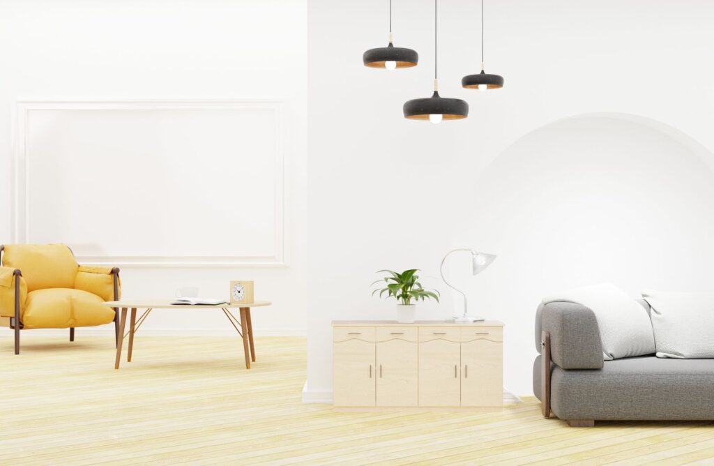 A bright white room with small pendants over a sideboard