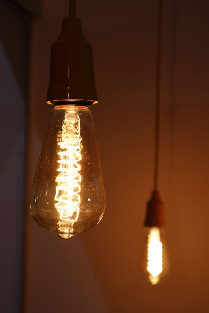Warm filament bulbs glowing in the dark