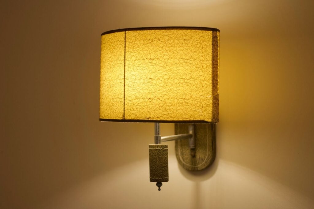 Swing Wall Lamp with a textured linen shade