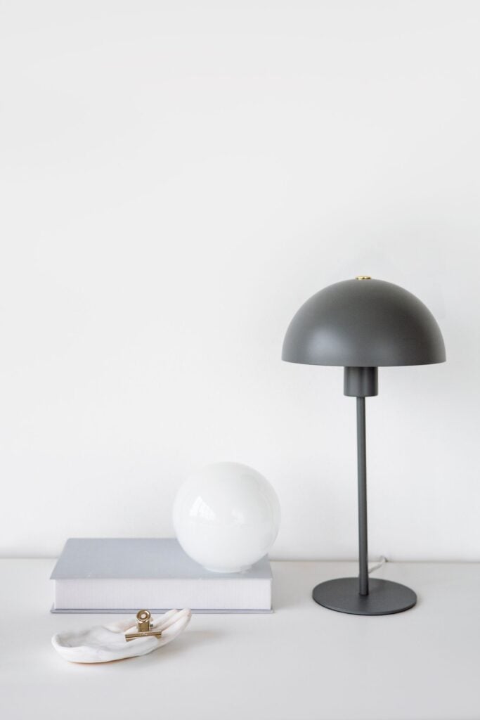 Dome Lamp in graphite on a white table